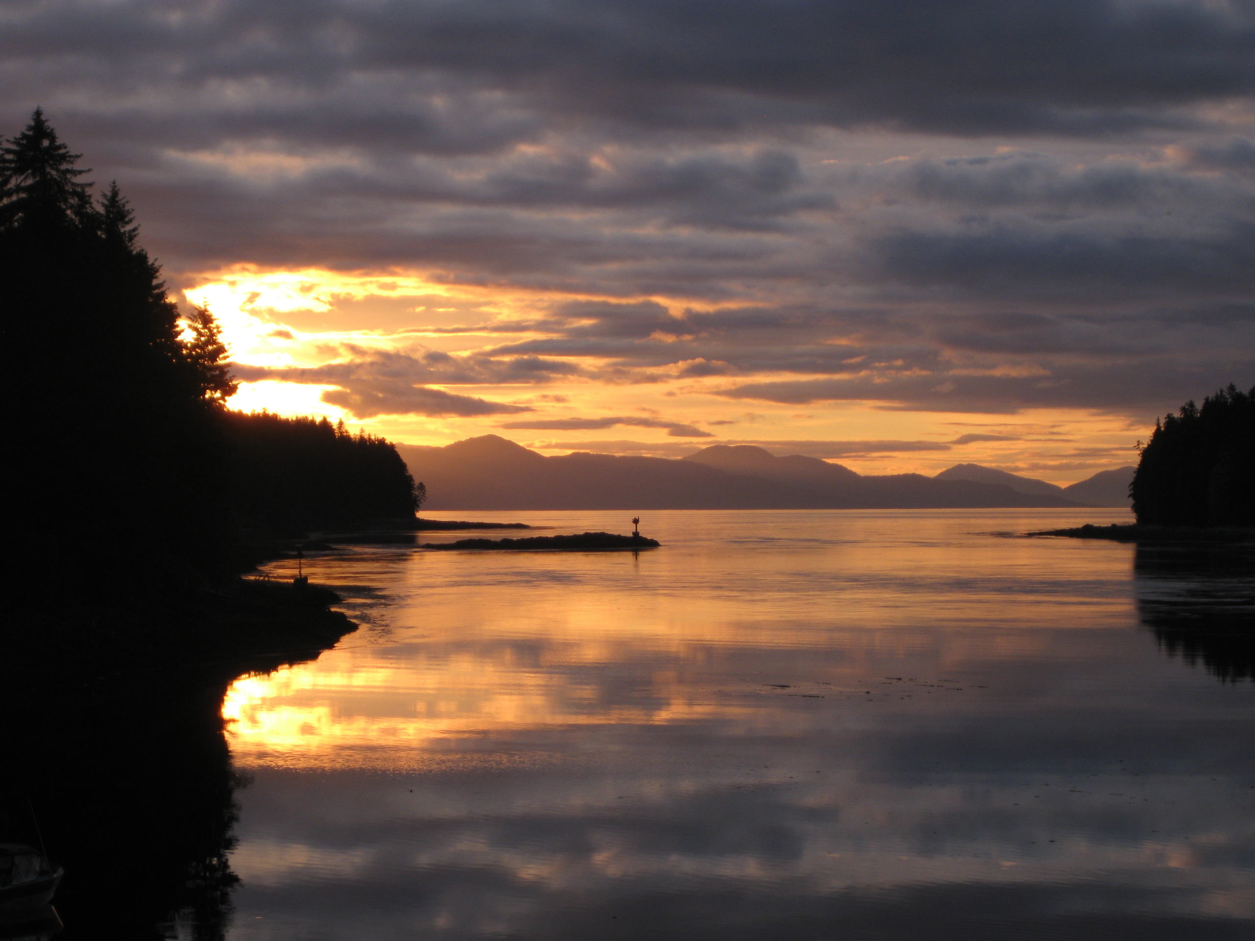 Alaska Fishing Lodge: A sunset view of the shoreline at Favorite Bay Lodge near Angoon, Alaska.